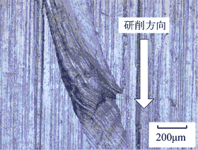 曲線型スクラッチの光学顕微鏡写真